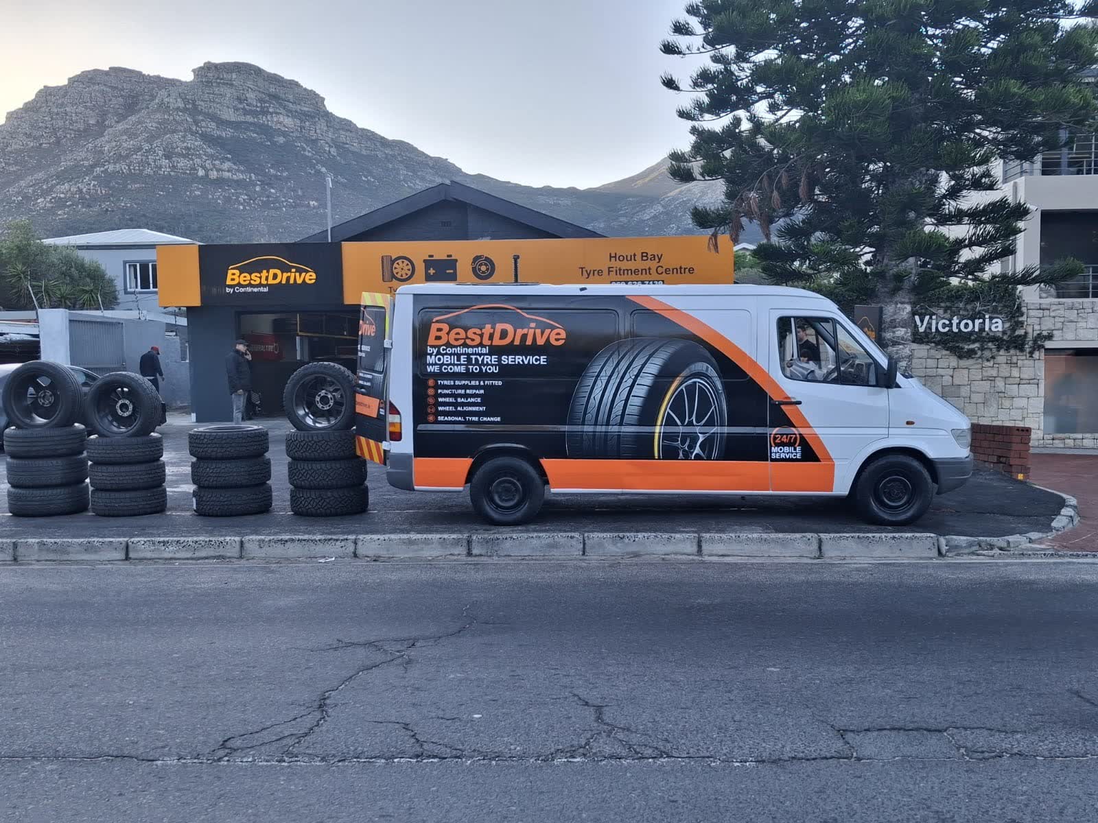 Best Drive mobile tyre fitment van parked with new tyres stacked alongside it in Cape Town