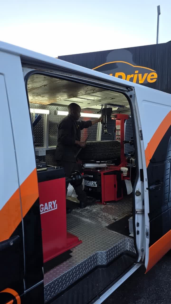 Tyre changer set up inside the Best Drive mobile fitment van